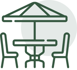 Outdoor table with umbrella and chairs